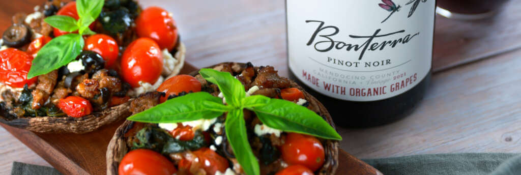 Bonterra Pinot Noir with Portobello pizzas dish on the side.